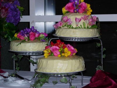 Three white cakes baked by Jennie Chuang for Taff and Rachel's wedding, The Atrium, San Francisco, CA, March 25, 2006; photo by Kimi Winters