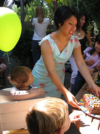 Kimi serving cake, Mountain View, CA, September 19, 2006; photograph by Vikki Yu
