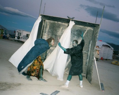 Rob van G. and Stephen at Burning Man 2000, sporting blue body dye Rob V. G. and Stephen in front of the De(s)sert Confe(c)sions (Confectionary Confessional) booth, Black Rock City, Nevada, 2000