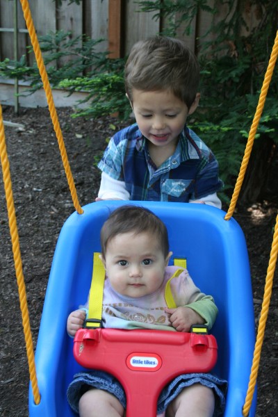 Sammy pushing Sophie on a swing, Palo Alto, CA, May 4th, 2008