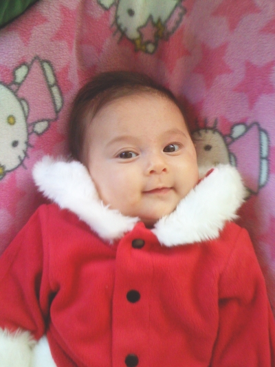Sophie, aged 3 months, dressed in her Santa suit, Mountain View, CA, sometime in December, 2007