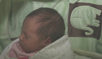 Sophie Mack, sleeping in her crib with an elephant blanket, October 3, 2007, Mountain View, CA
