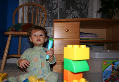 Sammy, playing with legos, startled, Mountain View, CA, October 19, 2006