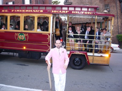 Taff, in his pink tuxedo jacket, in front of the wedding trolley, March 25, 2006, San Francisco, CA