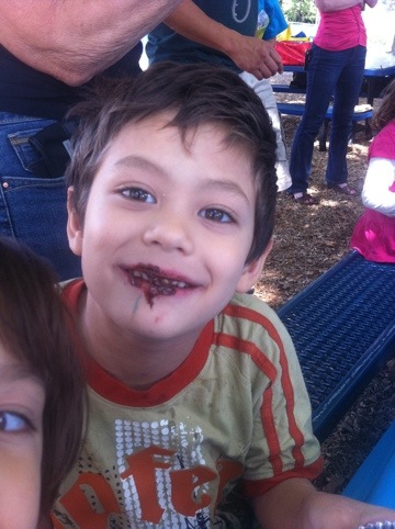 [Sammy, eating a cupcake, in Mountain View, Sunday, September 11, 2011