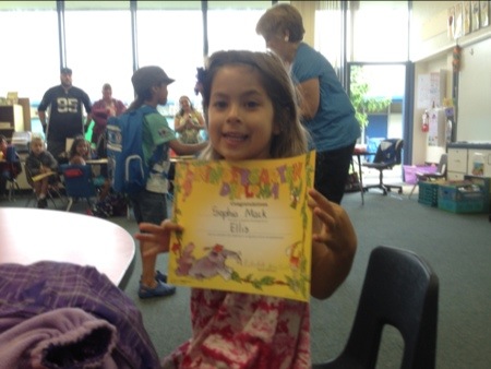 Sophie holding her diploma, Ellis School, Sunnyvale, CA, June 11, 2013